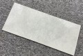 Płytka ścienna Gris szary beton w połysku 25x60 A4H276 Bost